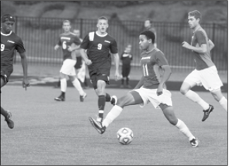 Austin Horton (#11, with ball) carries on a long family history of playing soccer. (ONU sports photo/Sports Information)